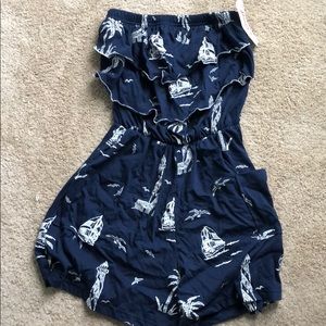 Strapless navy romper w/ pockets and navel designs